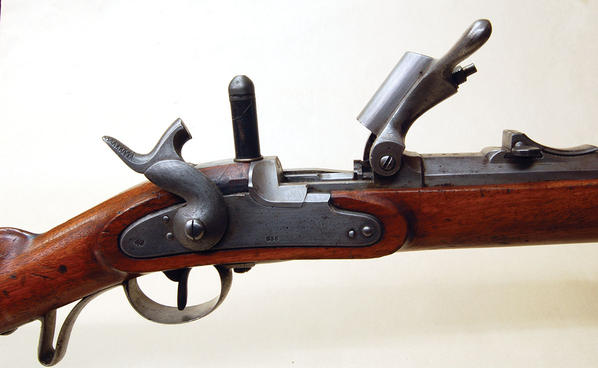 Austria’s first cartridge gun: a Waenzl conversion of its percussion muzzleloader. The cartridge shown is probably a commercial round.